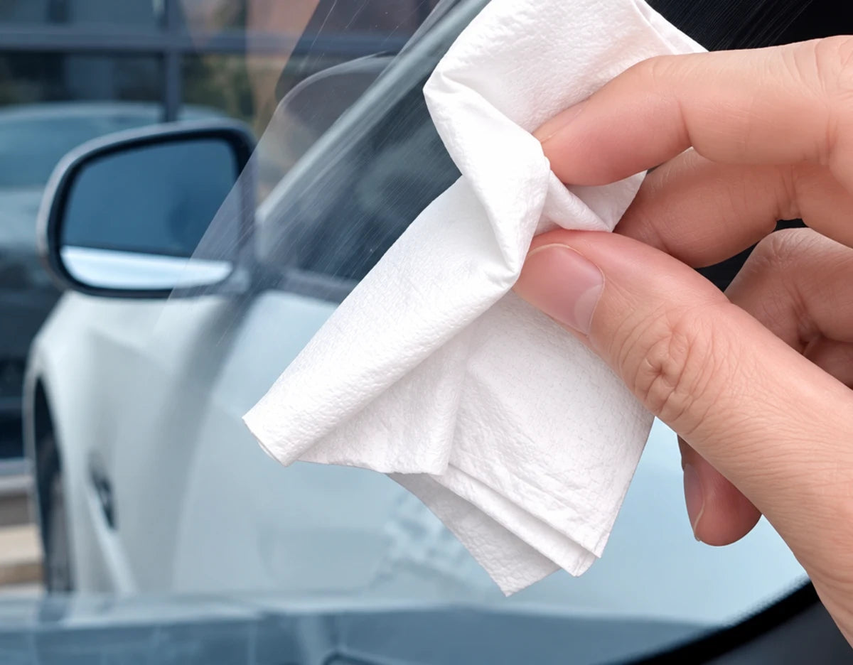 Clean the windshield before installing Veyra Eyes